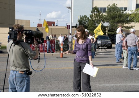 WICHITA, KANSAS - April 15: News reporter at the Tea Party gathering, April 15, 2010 in Wichita KS.