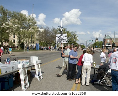 WICHITA, KANSAS - April 15: Tea Party members gather as part of a nation wide rally.  The crowd was holding banners and showing support for their cause, April 15, 2010 in Wichita Kansas