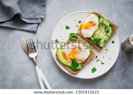 Image, Stock Photo Two poached eggs on brown bread