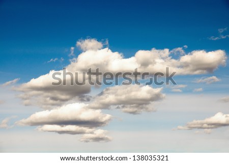 Clouds in blue sky. Horizontal image, copy space.