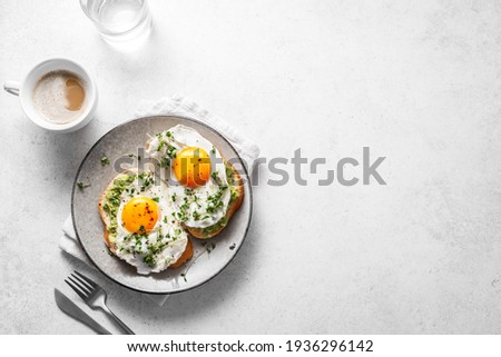 Similar – Image, Stock Photo Fried eggs with green asparagus. Fast lunch ideas, healthy breakfast, summer food.