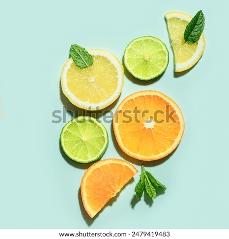 Similar – Foto Bild Frische Zitrusfrüchte: Zitrone, Limette und Orange mit kräftigem orangefarbenem Hintergrund