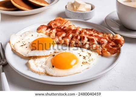 Image, Stock Photo Breakfast with egg, meat jamon, spinach and bread on terrace wooden table. Delicious homemade breakfast on balcony.