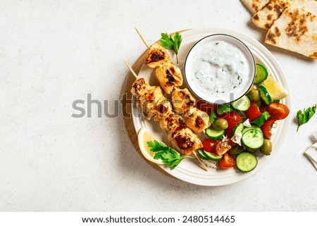 Similar – Image, Stock Photo Plate with a cucumber skewer on a white background