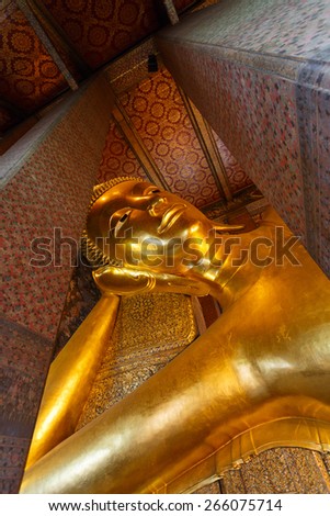 Reclining Buddha gold statue in Wat Pho, Bangkok, Thailand, Asian style Buddha Art