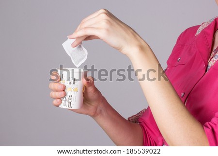 girl with a glass of hot water makes tea