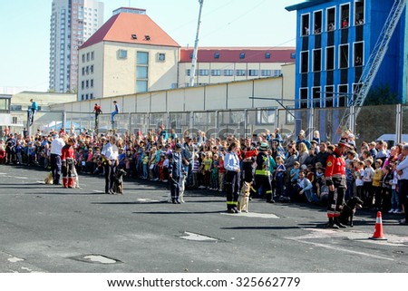 Kiev, Ukraine - October 04, 2015: Emergency rescue service. Rescuers with dogs to train before the audience