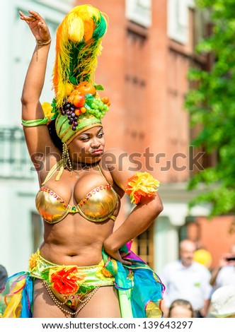 MOSCOW, RUSSIA - 18 MAY: Participants of annual carnival in Moscow in Ermitage Garden - latin dancer on stage. Moscow, 18 may, 2013