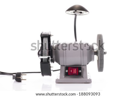 Bench grinder with lamp isolated on white background