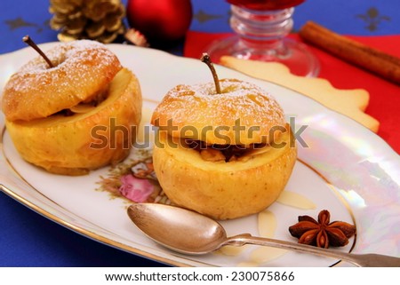 Two baked apples as Christmas Dessert, horizontal