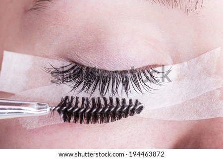 Beautiful young woman eyelash extension