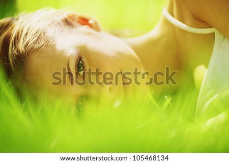 woman sleep on grass