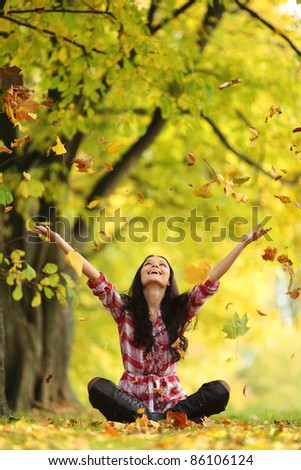 woman drop up leaves