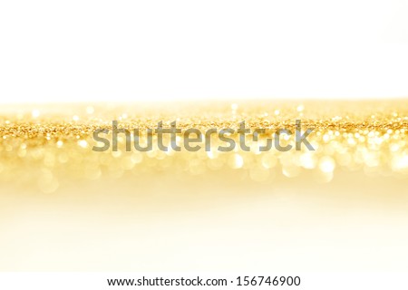 Abstract golden shiny holidays lights background