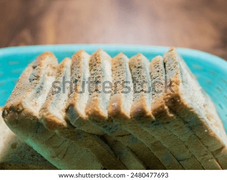 Similar – Foto Bild Ein Stück schimmeliger Parmesan Käse auf einem blauen Hintergrund