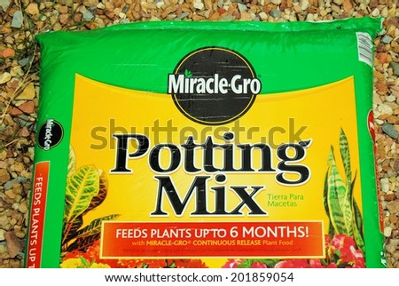 HAGERSTOWN, MD - APRIL 5, 4014: Image of Miracle Gro potting mix. The Miracle Gro brand is one of the most recognized brands in the lawn and garden industry.