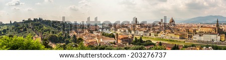 Panoramic view of Firenze from the Piazzale Michelangelo on a hot summer afternoon; Gardino di Boboli, river Arno, Ponte Vecchio, Palazzo Vecchio, Duomo, Campanile, Batistero. Florence, Italy, HDR