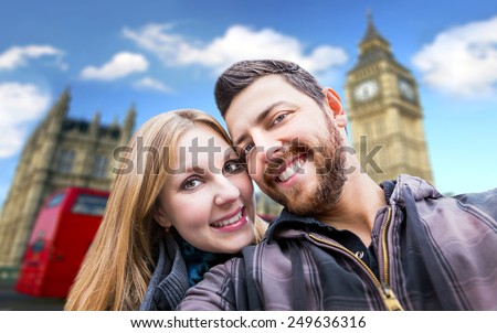 Beautiful Couple taking a selfie photo in London, England