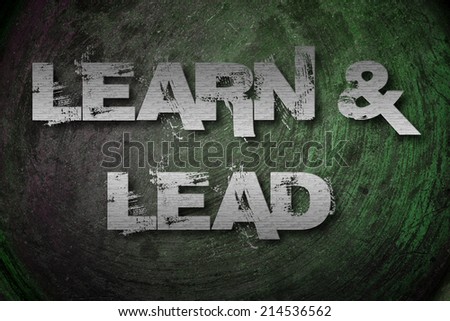 Learn And Lead Concept text on background