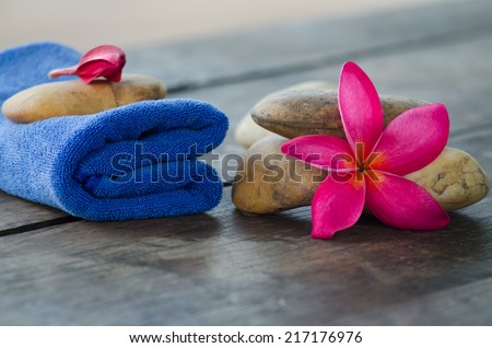 plumeria flower and Fabric with stone, concept of spa, treatment, relaxation and nature