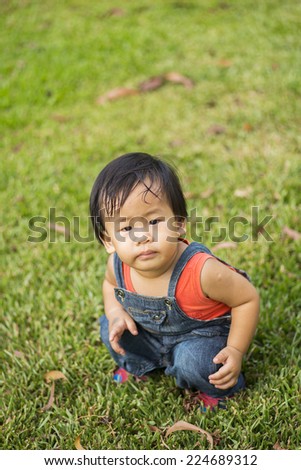 Cute boy plays in the park