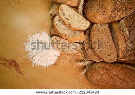 bakery background - breads, flour, wheat ears, seeds