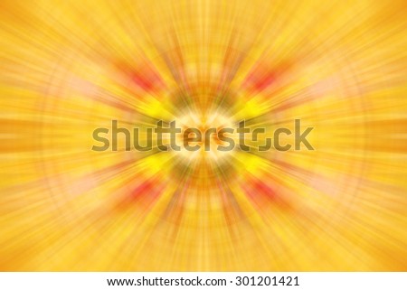 Autumn Blurred background image. Abstract image. Beauty of nature. Bright red, yellow, green, orange. Substrate, texts about sun, summer, nature, fall. Blur radially effect. Energy, yoga, meditation.