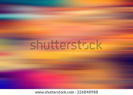 Autumn abstract color background. Blurring nature background. Blurred light. Variety of color. Background for motivational text. Abstract blurred textured background orange, pink, red, violet patterns