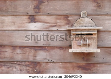 Letter Box on Wood Wall