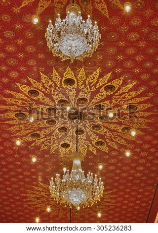 NONG KHAI, THAILAND - AUGUST 11, 2015 : The Lantern and Thai Painting Style Art on ceiling at the temple of WAT PHO CHAI, Mueang Nong Khai Municipality, Thailand