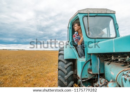 Similar – Image, Stock Photo Female farmer with tractor on olive plantation