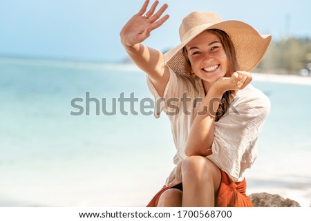 Similar – Image, Stock Photo Young woman in hat standing in garden