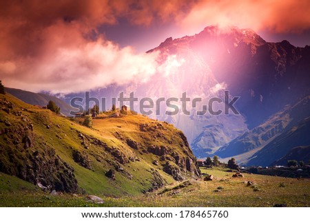 Awesome bright sunset in the mountains, landscape in bright colors