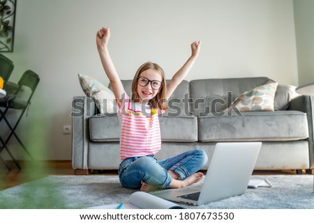 Similar – Image, Stock Photo Little girl, eight years old, sitting on the grass outdoors.