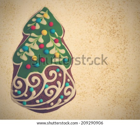 Ginger and Honey cookie in the shape of a Christmas fir tree with white sugar decoration