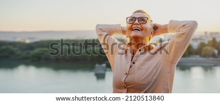 Similar – Image, Stock Photo Stylish elderly woman in round sunglasses