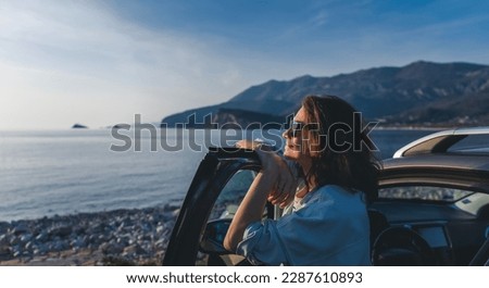 Similar – Image, Stock Photo Traveler enjoying freedom while standing on hilltop and observing wide highland