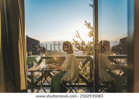 Similar – Image, Stock Photo Laptop on terrace table in front of flowers