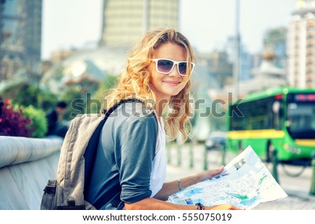 Similar – Image, Stock Photo happy backpacker caucasian woman at platform on train station using mobile phone. Travel concept