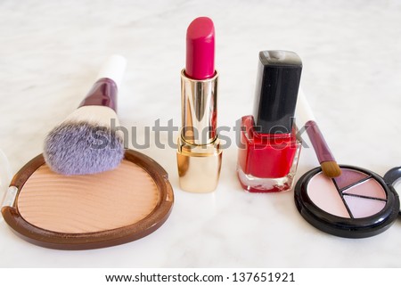 make up facial powder foundation lipstick and nail polish