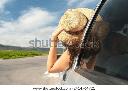 Similar – Image, Stock Photo Unrecognizable woman enjoying freedom near waving sea