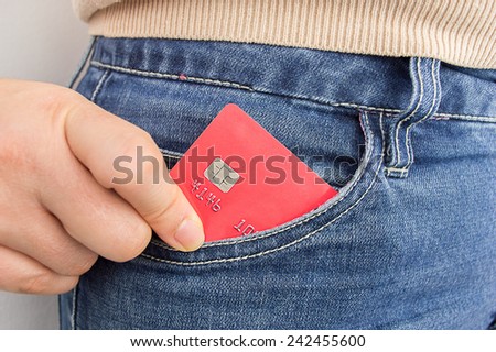 cropped  shot of a woman s pocket with the credit card to buy