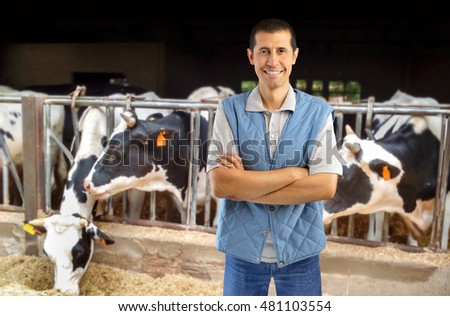 Similar – Image, Stock Photo Man stands with Frisian mink on the coast in the dunes