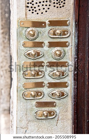 Vintage door bell buttons in a old apartment