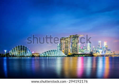 SINGAPORE - MAY 7: Panorama of Singapore city skyline by night, on May 7, 2015 in Singapore.