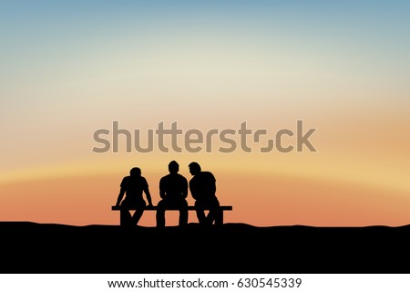 men sitting and talking at sunset