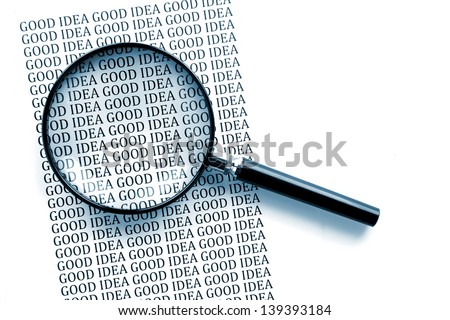 Concept photo showing magnifying glass magnifying the words good idea