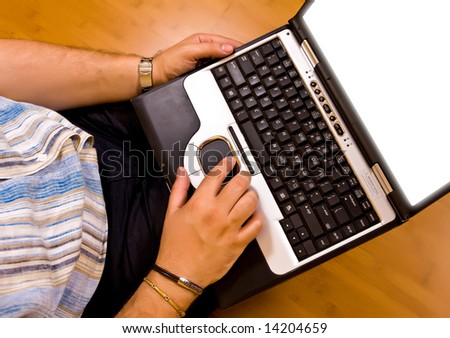 man lying down on bamboo floor work with his laptop 01