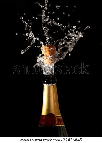 champagne bottle with shooting cork background