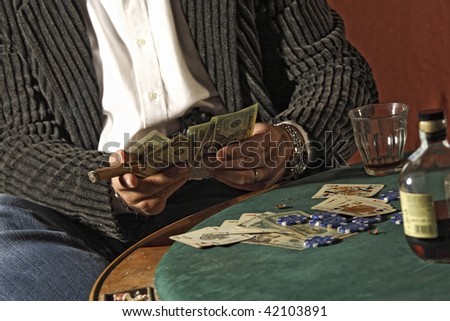 detail of man play poker game, winner take the money